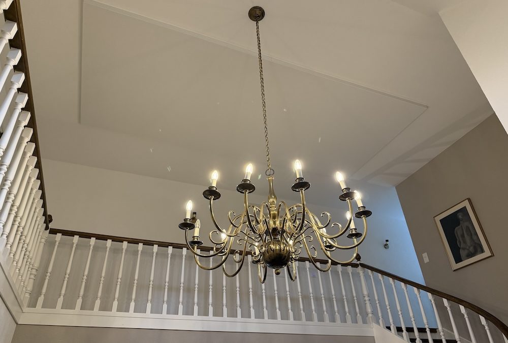 Plafond acoustique tendu dans un hall entrée à Morges