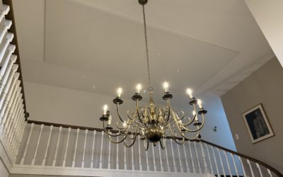 Plafond acoustique tendu dans un hall entrée à Morges
